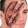 Spirit Halloween Shredded Scar Appliance -Costume Themes Shop 01297696 a